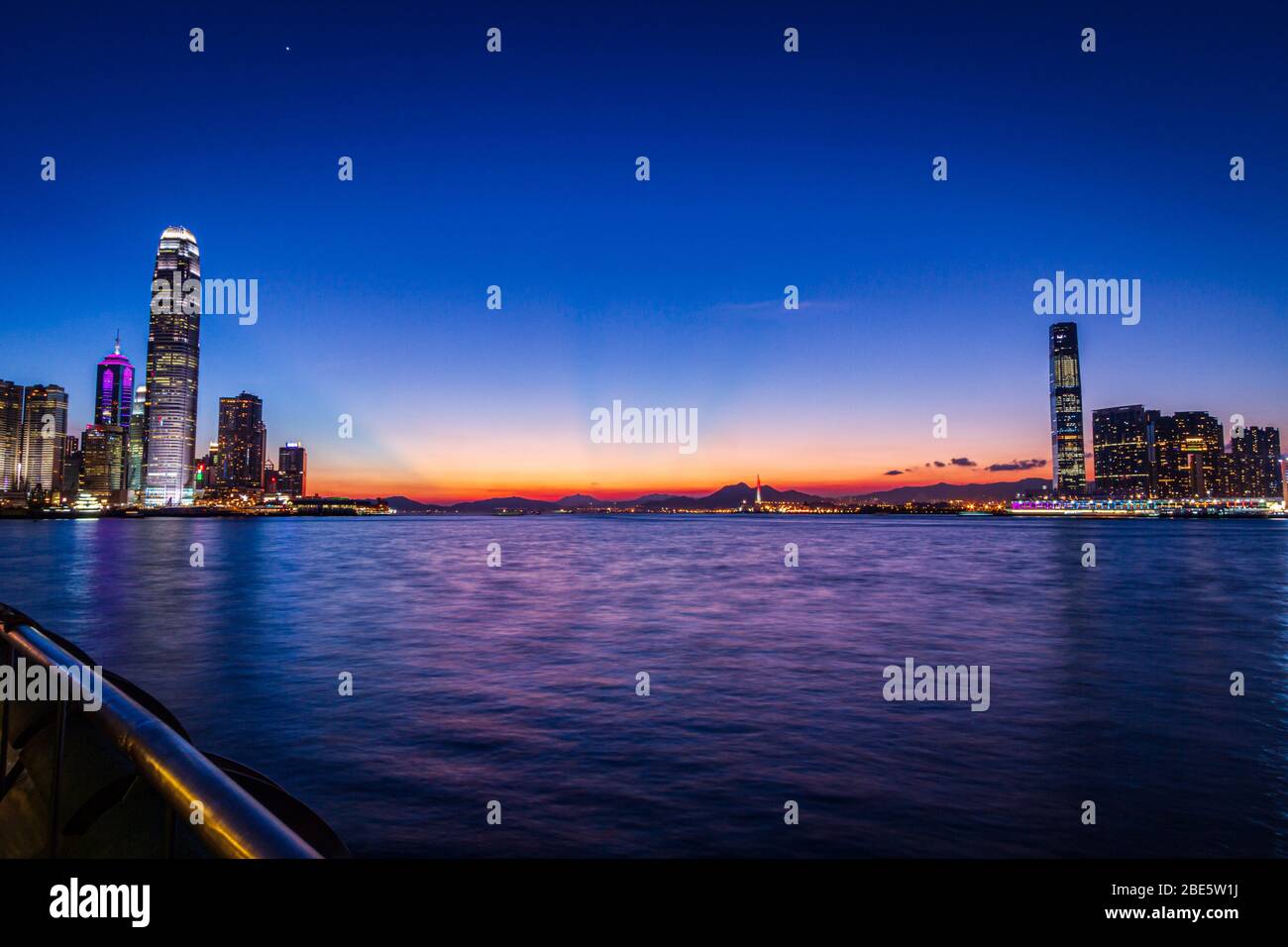 City view of Victoria Harbour of Hong Kong at Magic Hour Stock Photo