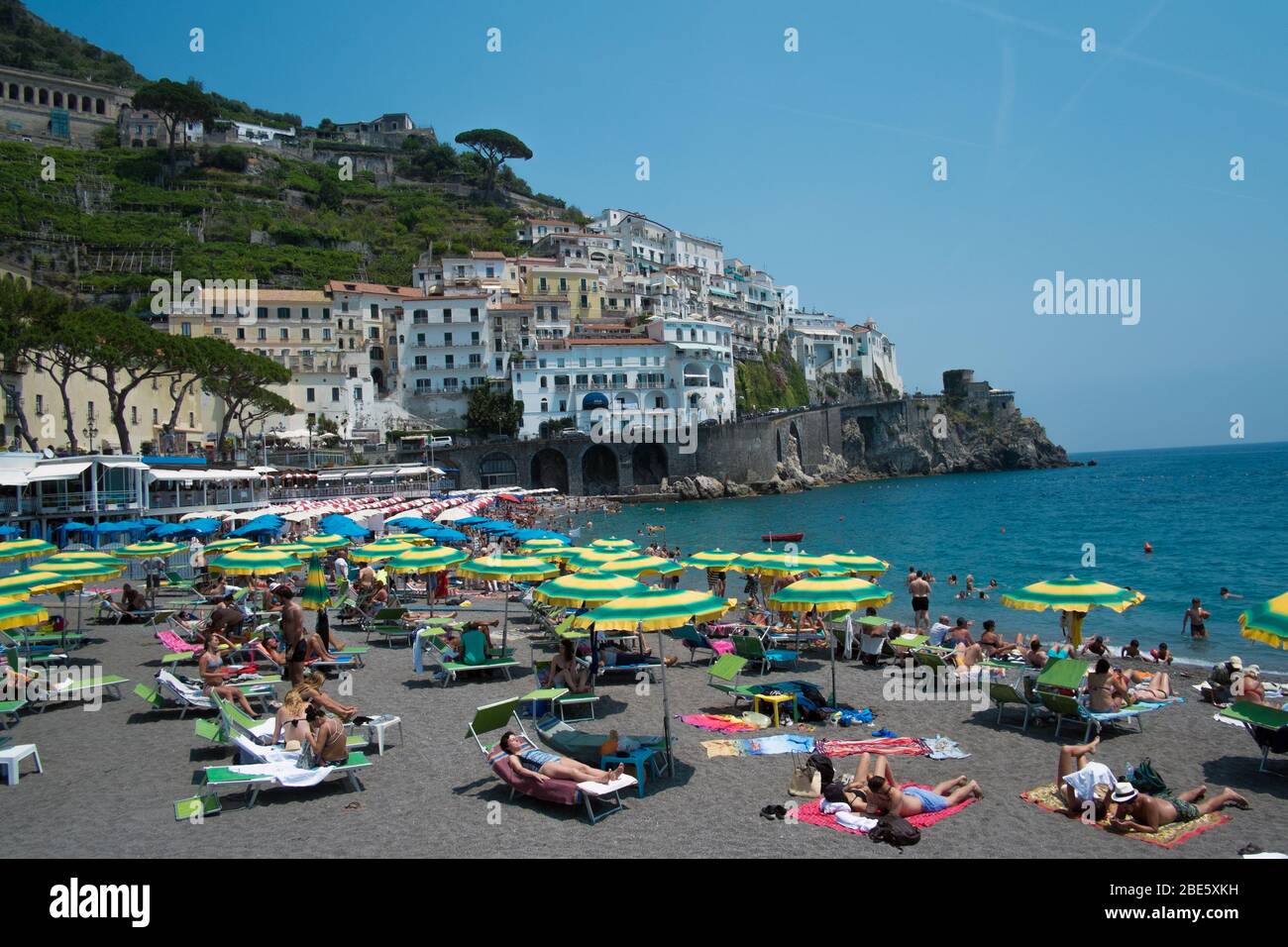 Sunbather sunbathing on the seaside of the Amalfi Coast, Italy Stock Photo