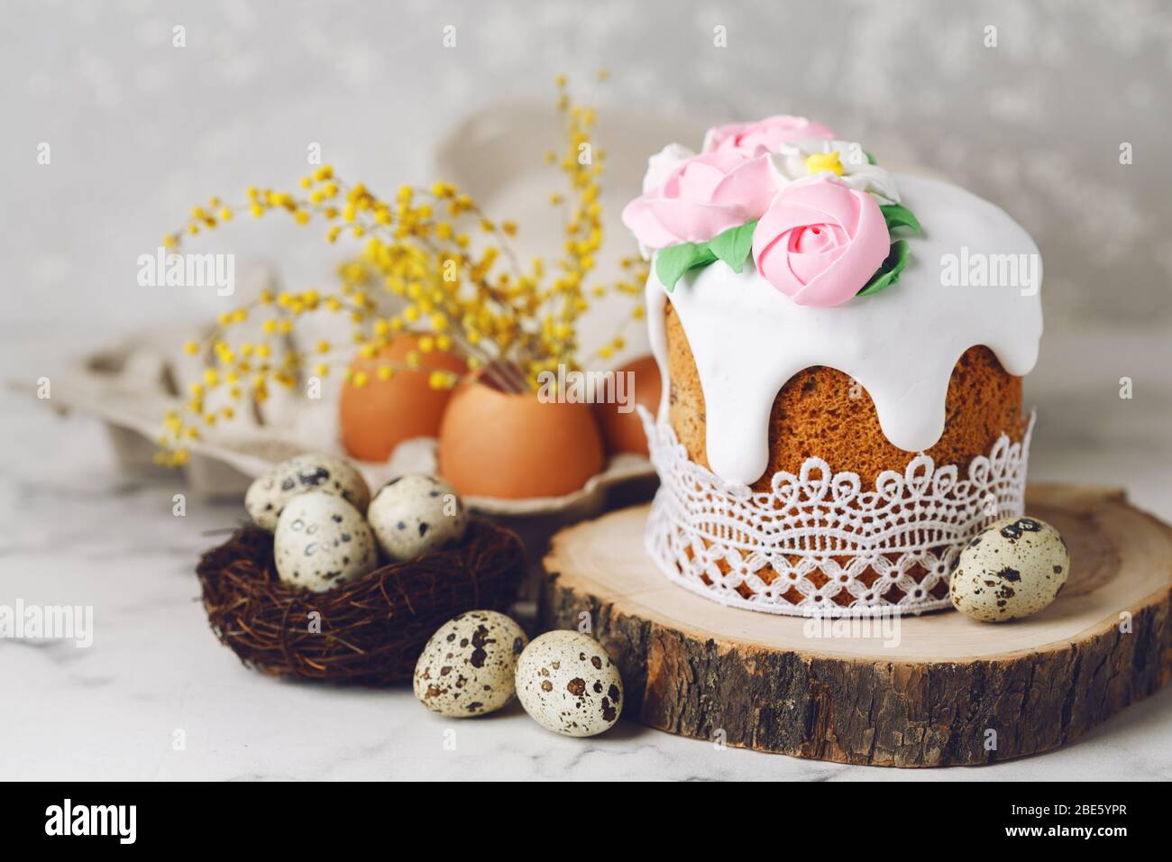 Easter rustic composition with quail eggs in the nest. Holiday background. Copy space Stock Photo