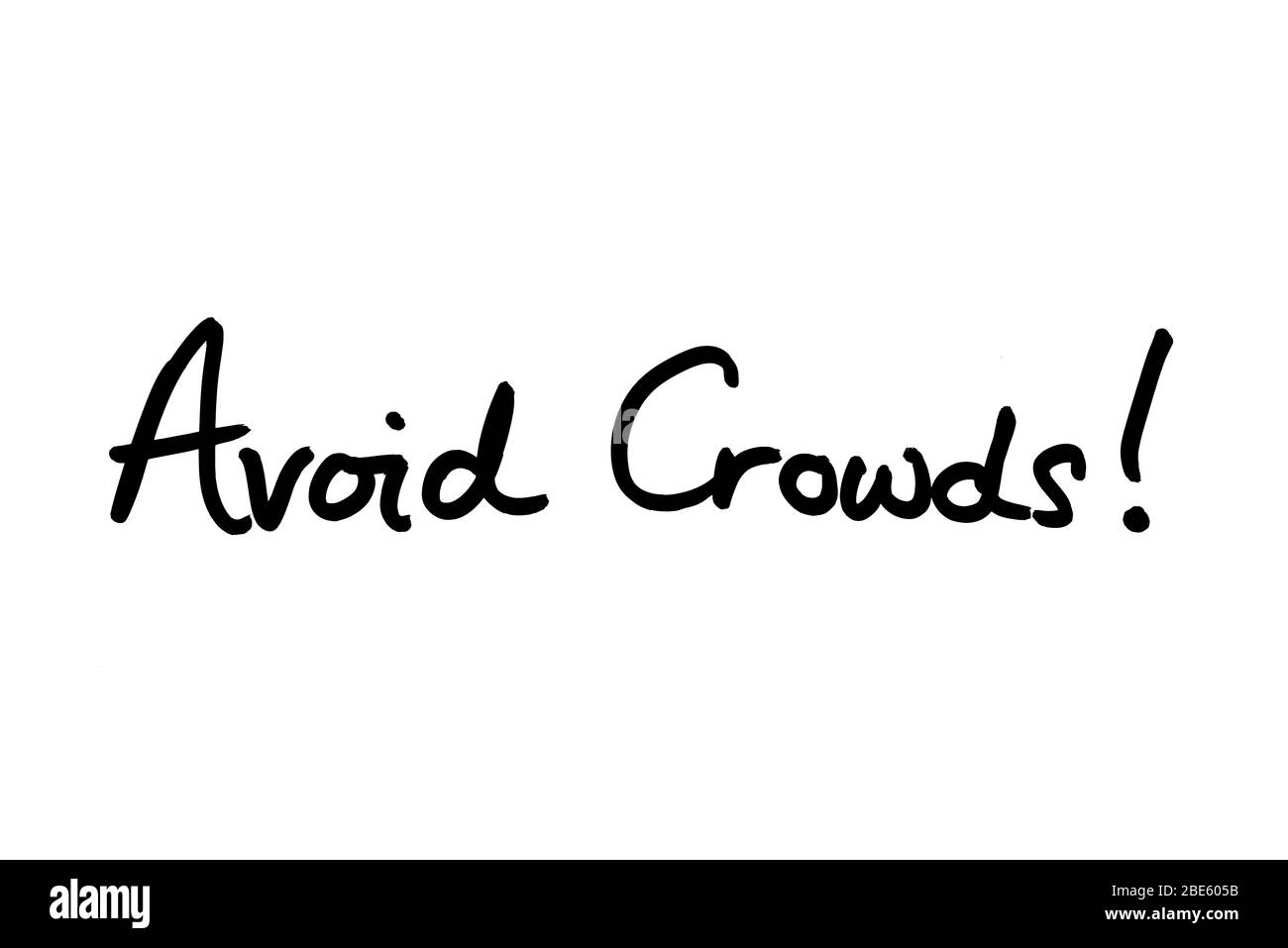 Avoid Crowds! handwritten on a white background. Stock Photo