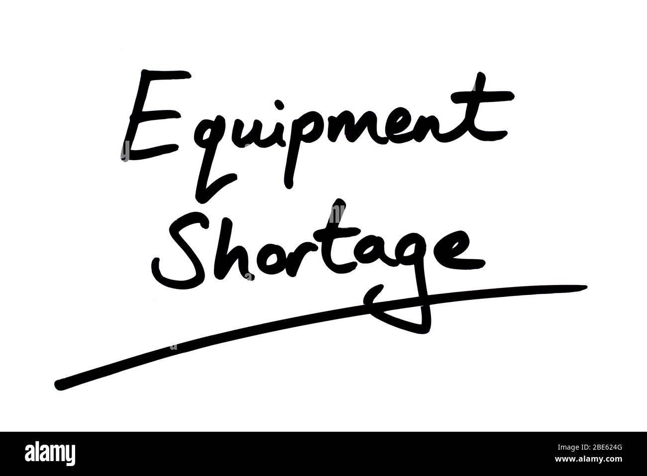 Equipment Shortage handwritten on a white background. Stock Photo