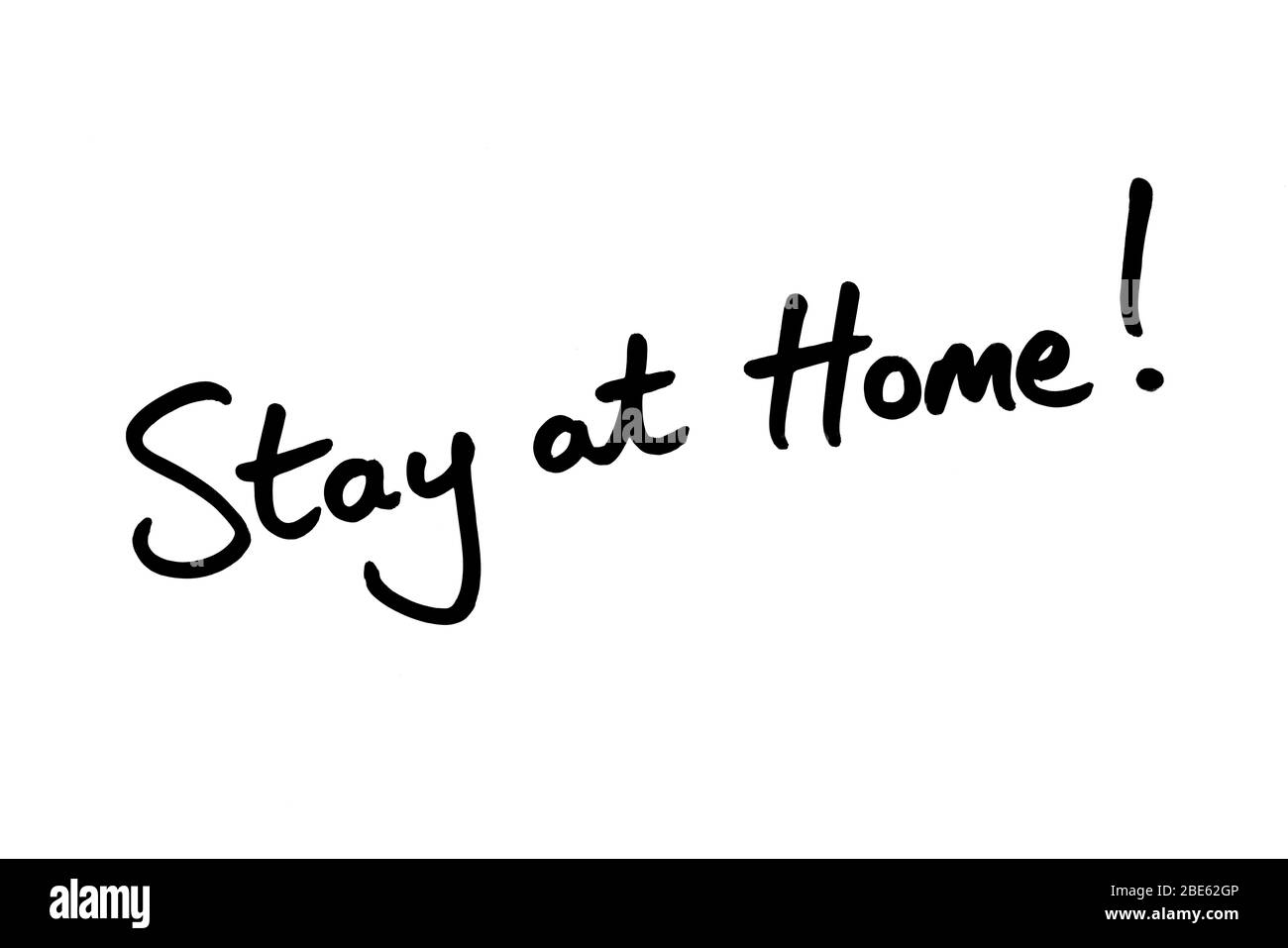 Stay at Home! handwritten on a white background Stock Photo Alamy
