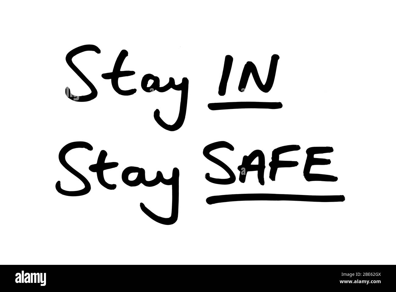 Stay IN Stay SAFE handwritten on a white background Stock Photo Alamy