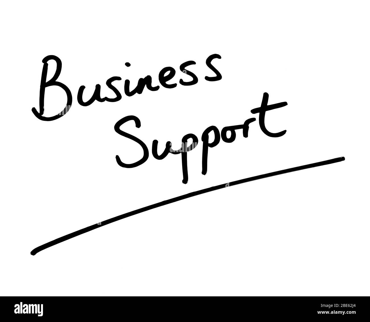 Business Support handwritten on a white background. Stock Photo