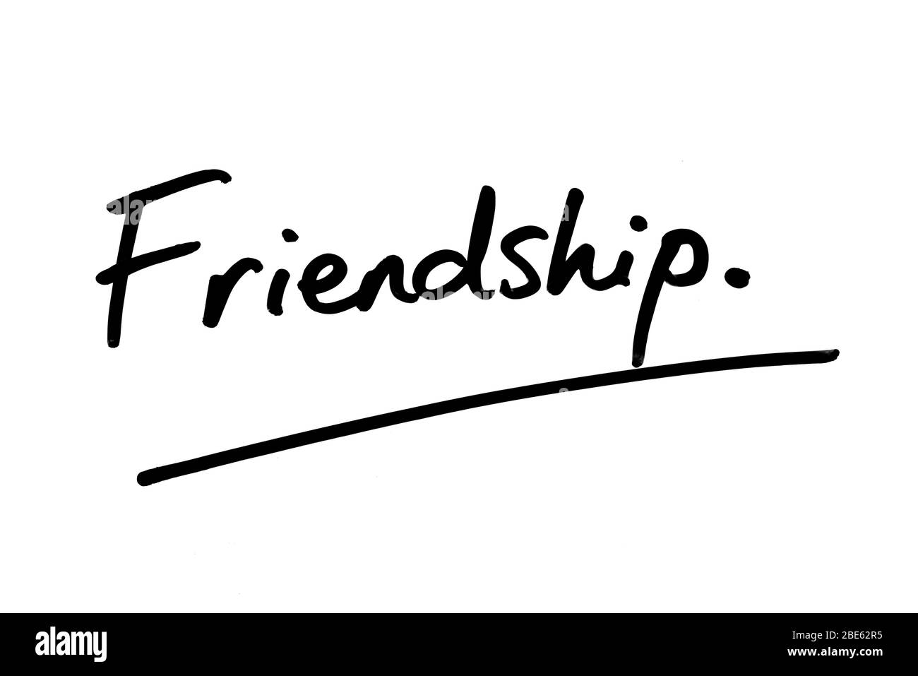 Friendship handwritten on a white background. Stock Photo