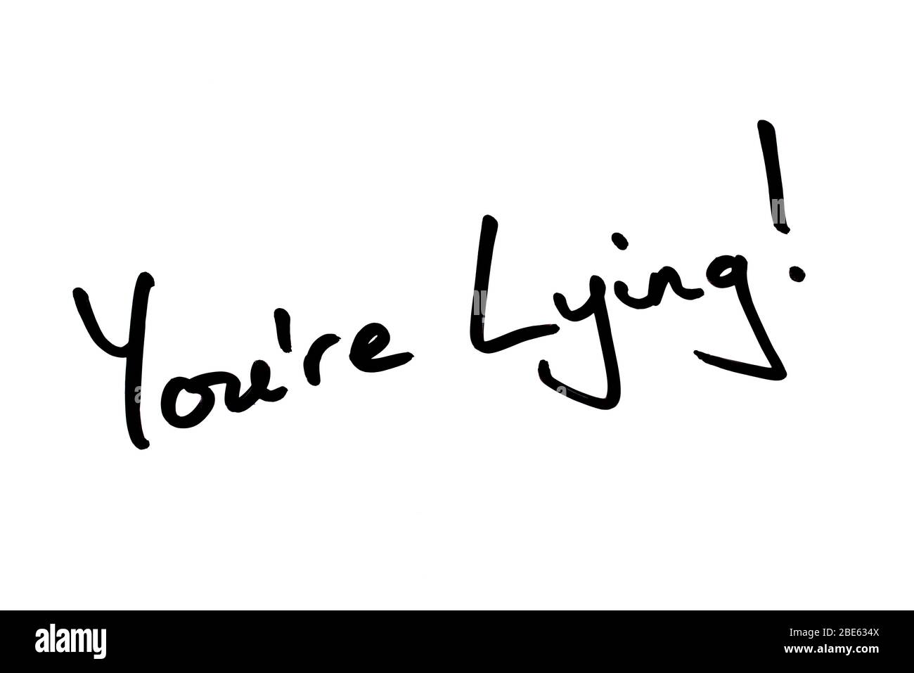 Youre Lying! handwritten on a white background. Stock Photo
