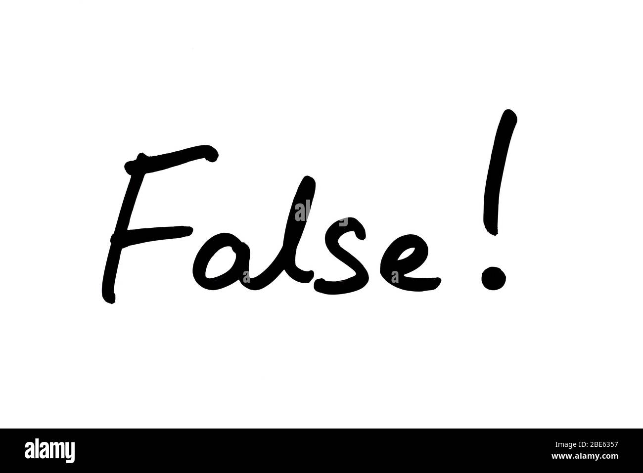 The word False! handwritten on a white background. Stock Photo