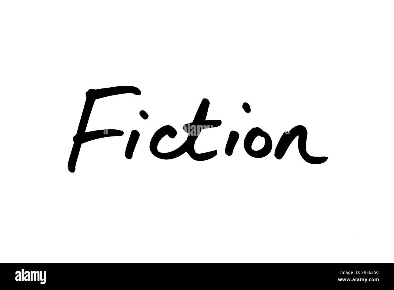 The word Fiction handwritten on a white background. Stock Photo