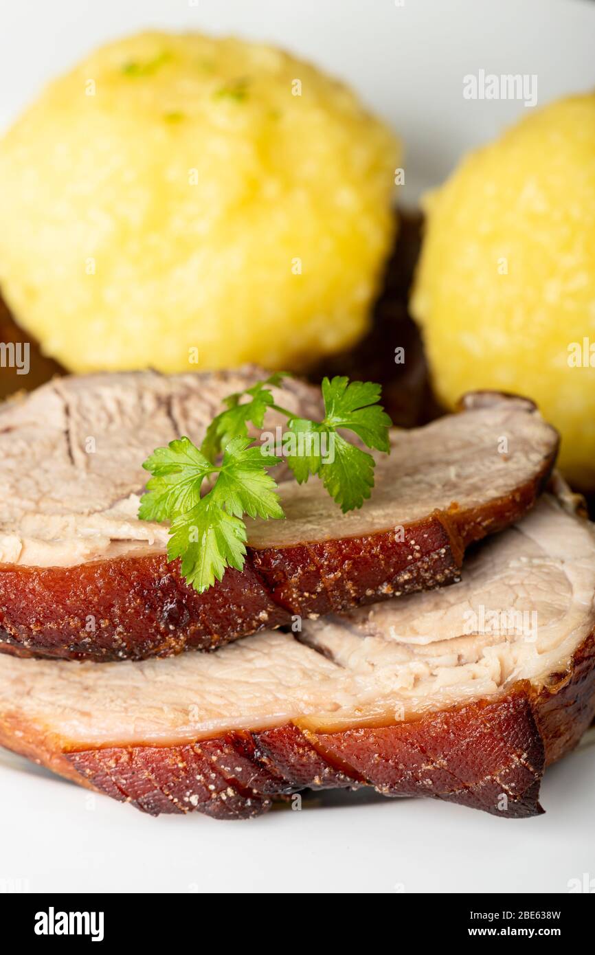 bavarian roasted pork with dumplings Stock Photo Alamy