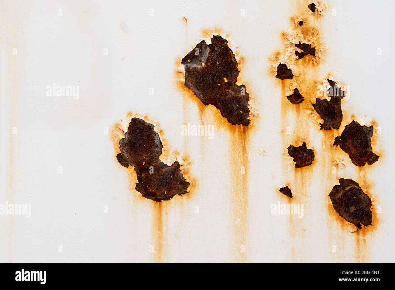 background large rusty spot, peeling white paint, streaks Stock Photo ...