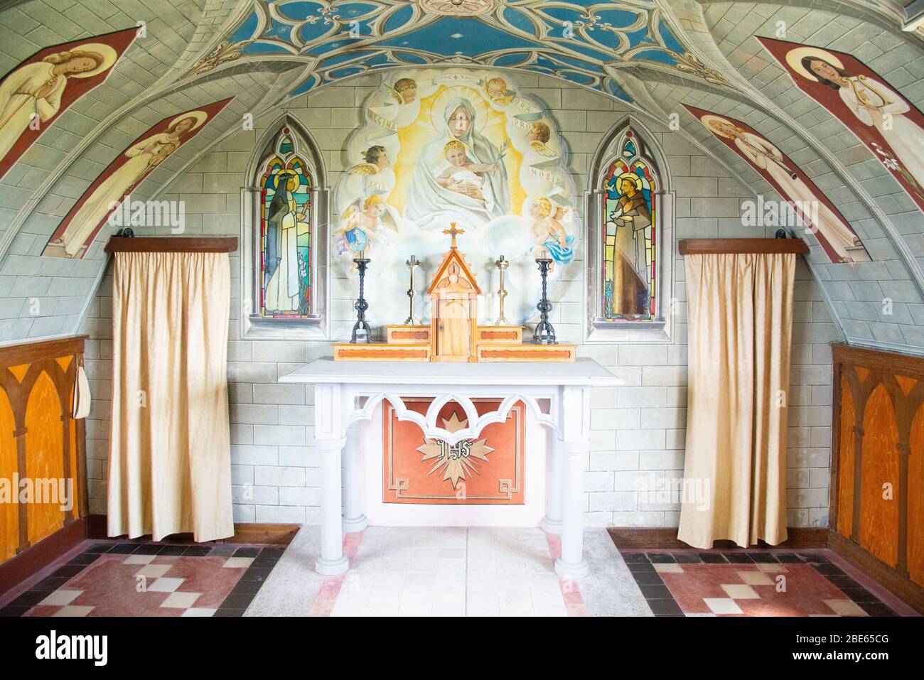 This Chapel was built by Italian Prisoners of War on an Orkney Island using a Nissan hut painted inside and outside. They also added church features. Stock Photo