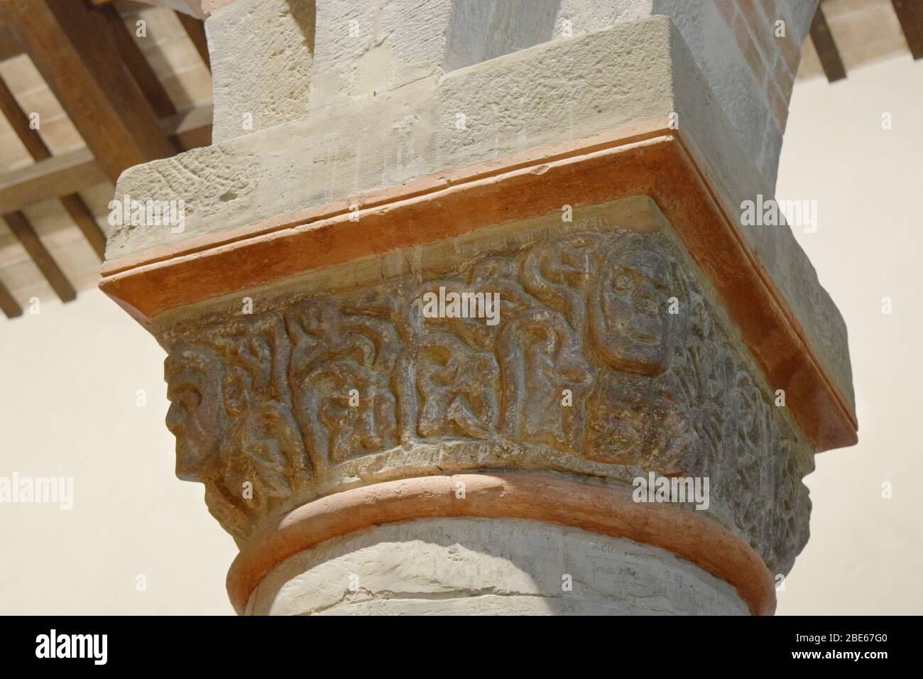 Pieve (rural parish Church) of San Donato in Polenta. Bertinoro, Italy. Basilica Interior. Capital detail with foliage and green man. Stock Photo