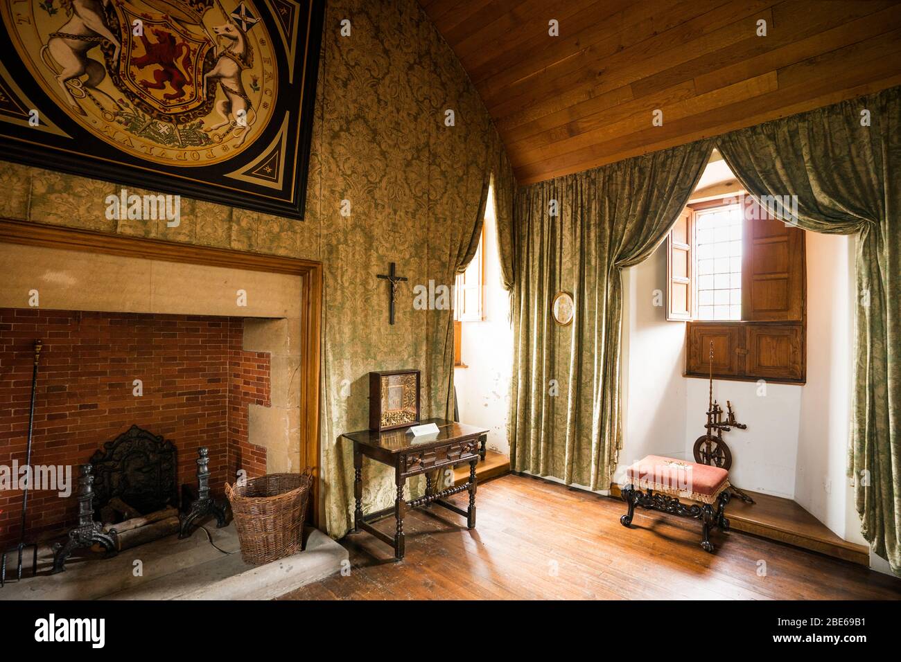 Bedroom of Mary Queen of Scots has fabric wall hangings and a four-poster bed upstairs inside Falkland Castle, home of Mary Queen of Scots, Falkland, Stock Photo