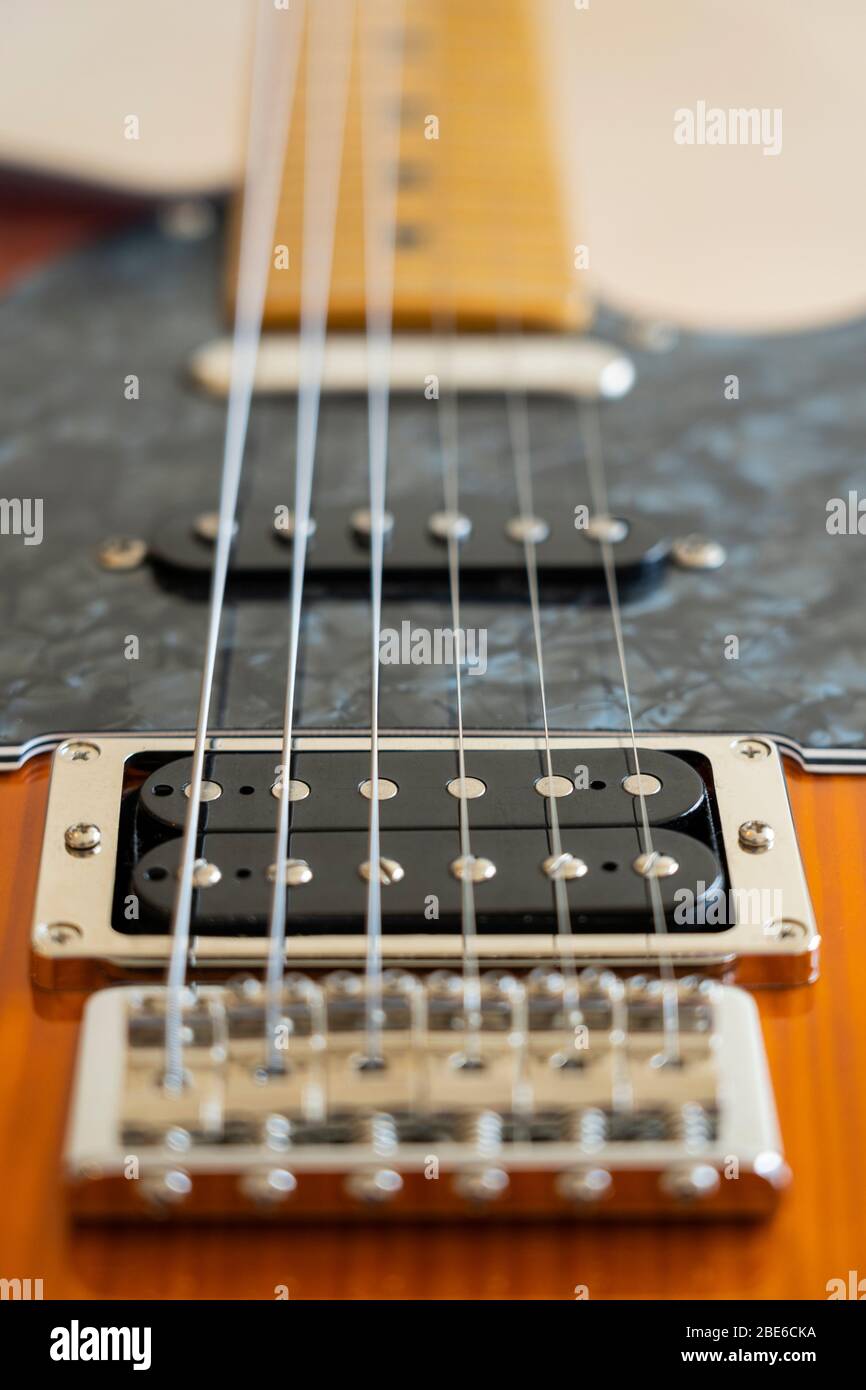 A Fender Modern Player Telecaster electric guitar with a honey burst