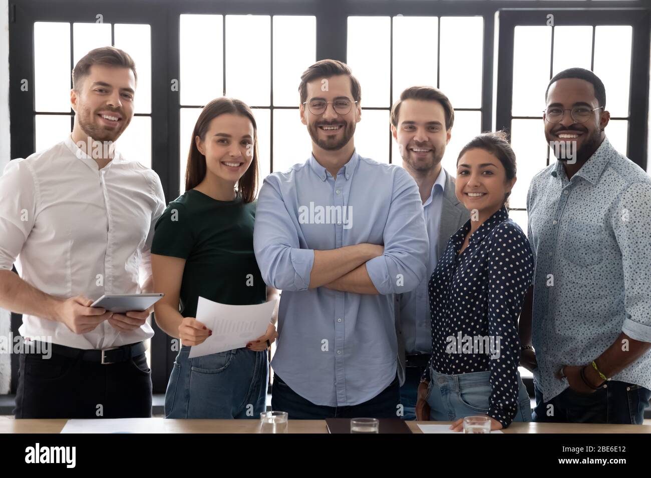 Young smiling multicultural businesspeople hi-res stock photography and ...