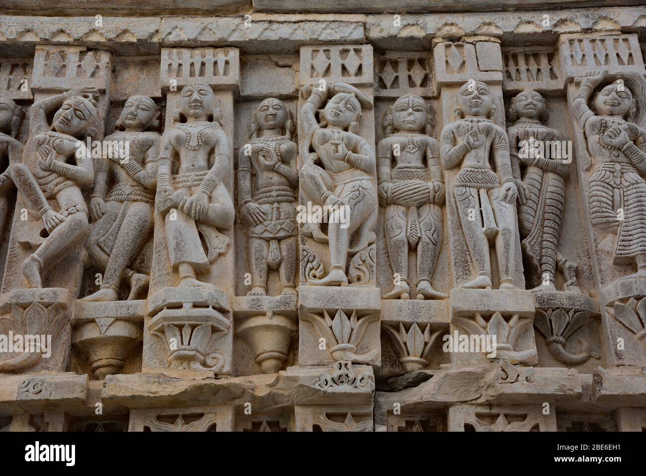 Elaborate details of female dancers carved into the exterior of the 17th century Jagdish temple of Vishnu, Udaipur, India, Asia. Stock Photo