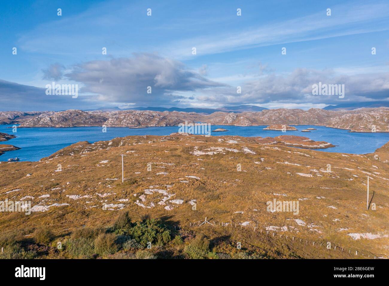 Drone shoot over Loch Laxford Islands at bright autumnal day in the North West Highlands of Scotland - NC500 Route Stock Photo