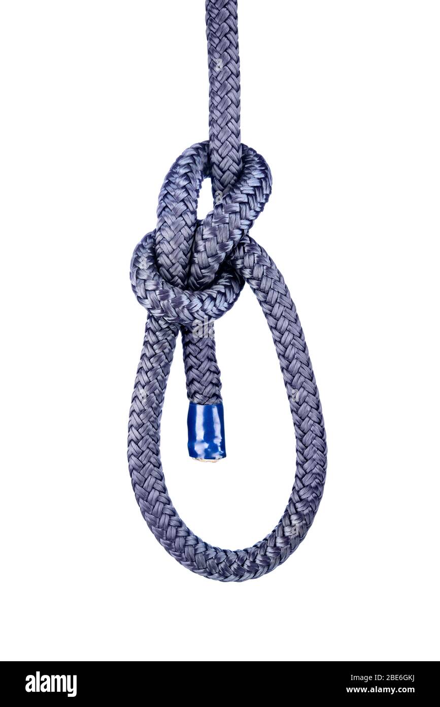 The bowline is a simple, ancient knot use to form an end of rope loop for which to attach clips and other hooked devices. Stock Photo