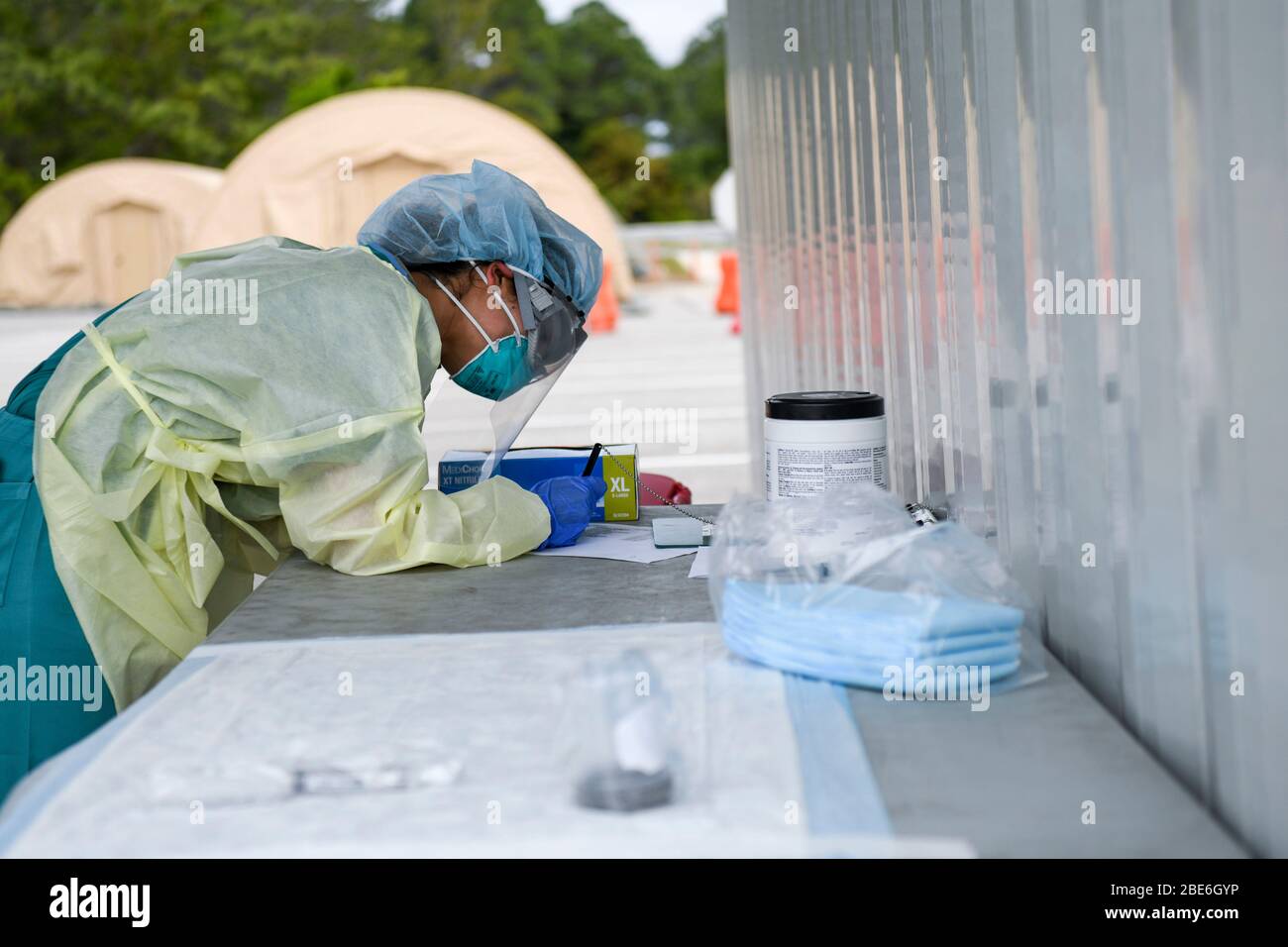 U.S. Air Force Senior Airman Melanie Domenech, collects medical data