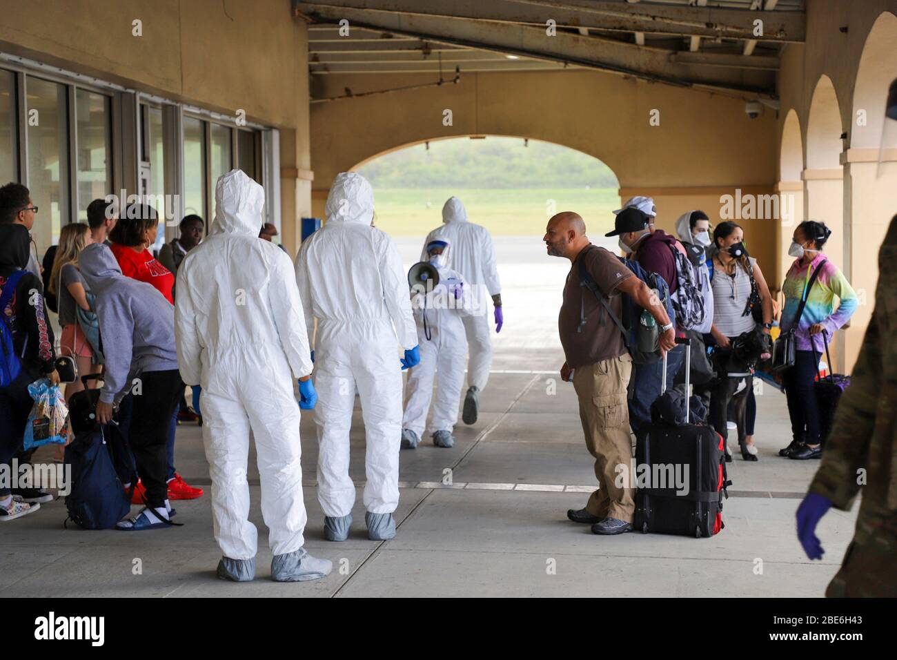 Virgin Islands National Guard soldiers screen arriving passengers in an effort to contain the outbreak of COVID-19, coronavirus pandemic at the Henry E. Rohlsen Airport April 7, 2020 in Christiansted, St Croix, Virgin Islands. Stock Photo