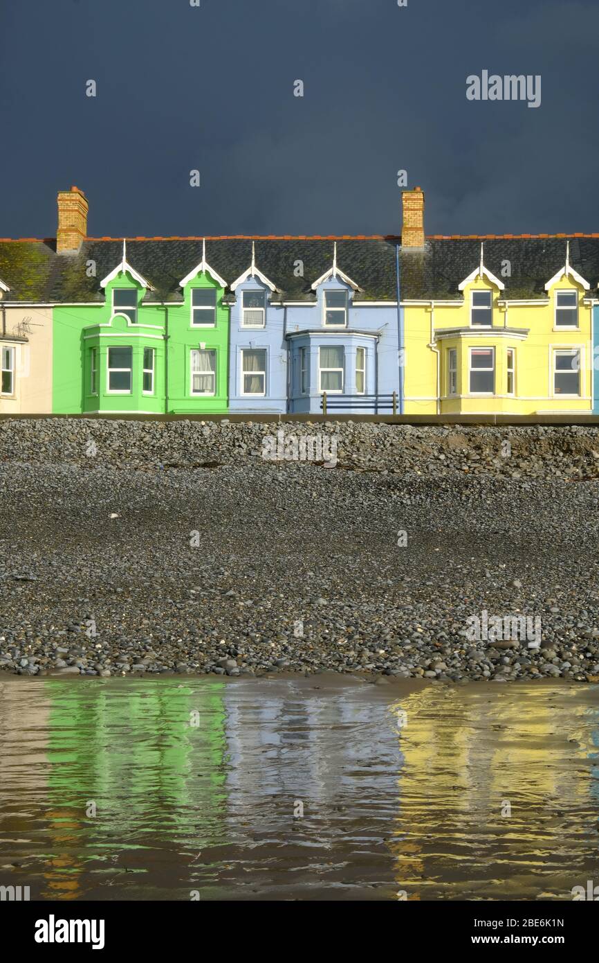 colourful terraced houses on the sea front at Borth, Wales Stock Photo