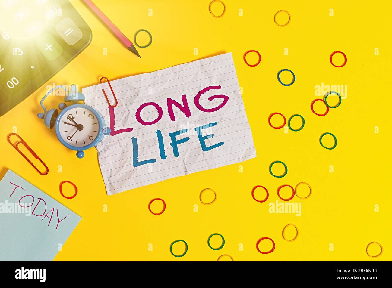 Conceptual Hand Writing Showing Long Life Concept Meaning Able To Continue Working For Longer Than Others Of The Same Kind Alarm Clock Note Rubber Ba Stock Photo Alamy