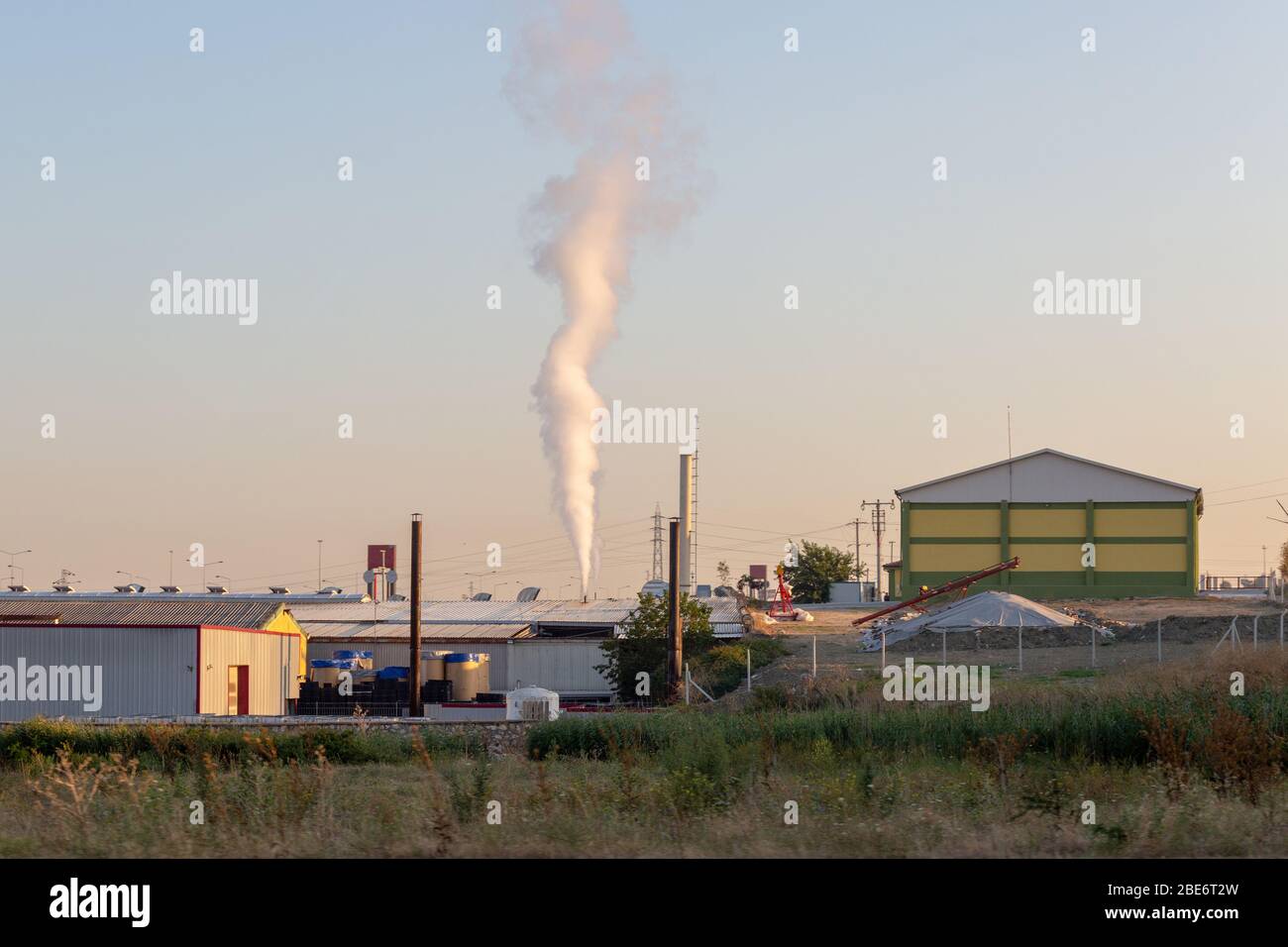 Small Chemical Plant Releases Exhaust Steam from its Chimney Stock
