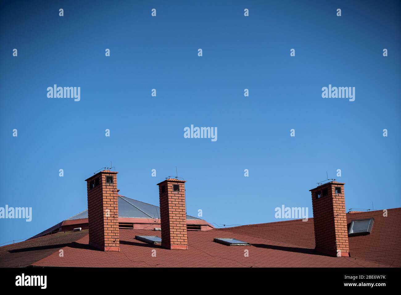 Ventilation chimneys are used to get rid of used air from living quarters Stock Photo