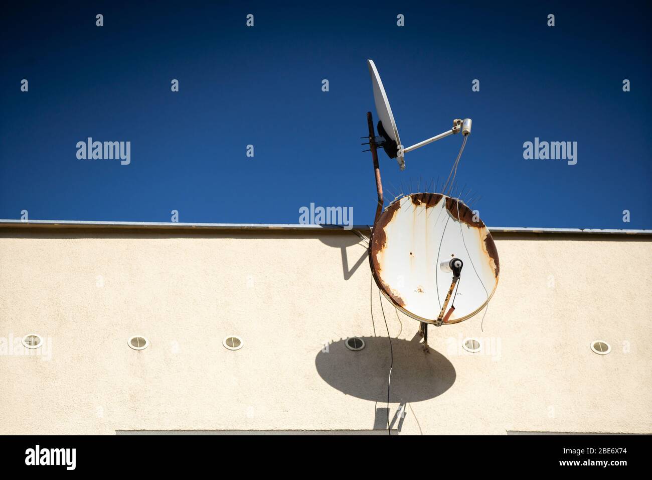 Round satellite dishes are receivers of waves