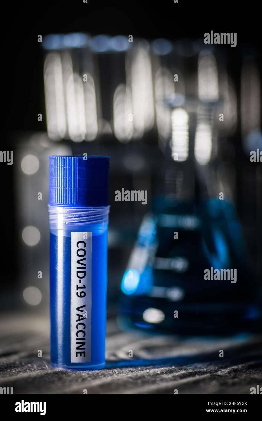 Conceptual image of a recipient containing a vaccine for coronavirus ...