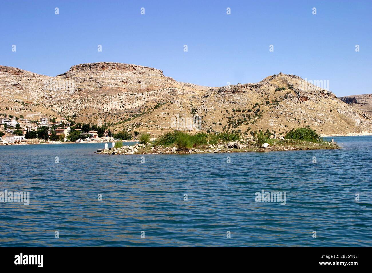 Sunken village Savasan and small cemetery island in Euphrates River (Firat), Halfeti, Gaziantep, Turkey. Stock Photo