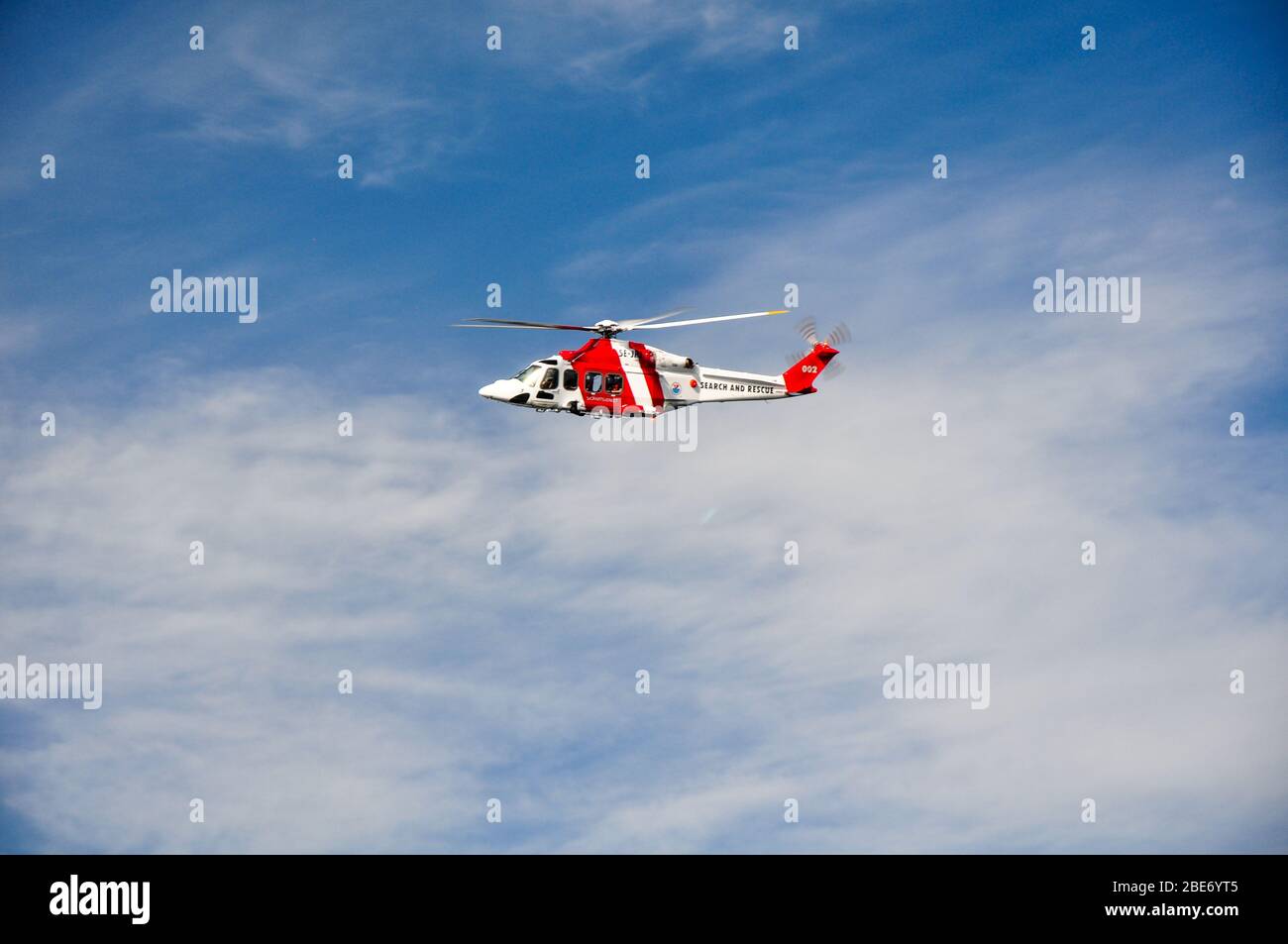 Search and Rescue Helicopter circling over Stockholm, Sweden Stock