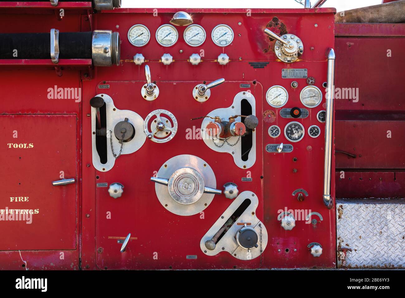 The equipment side of a classic fire engine Stock Photo