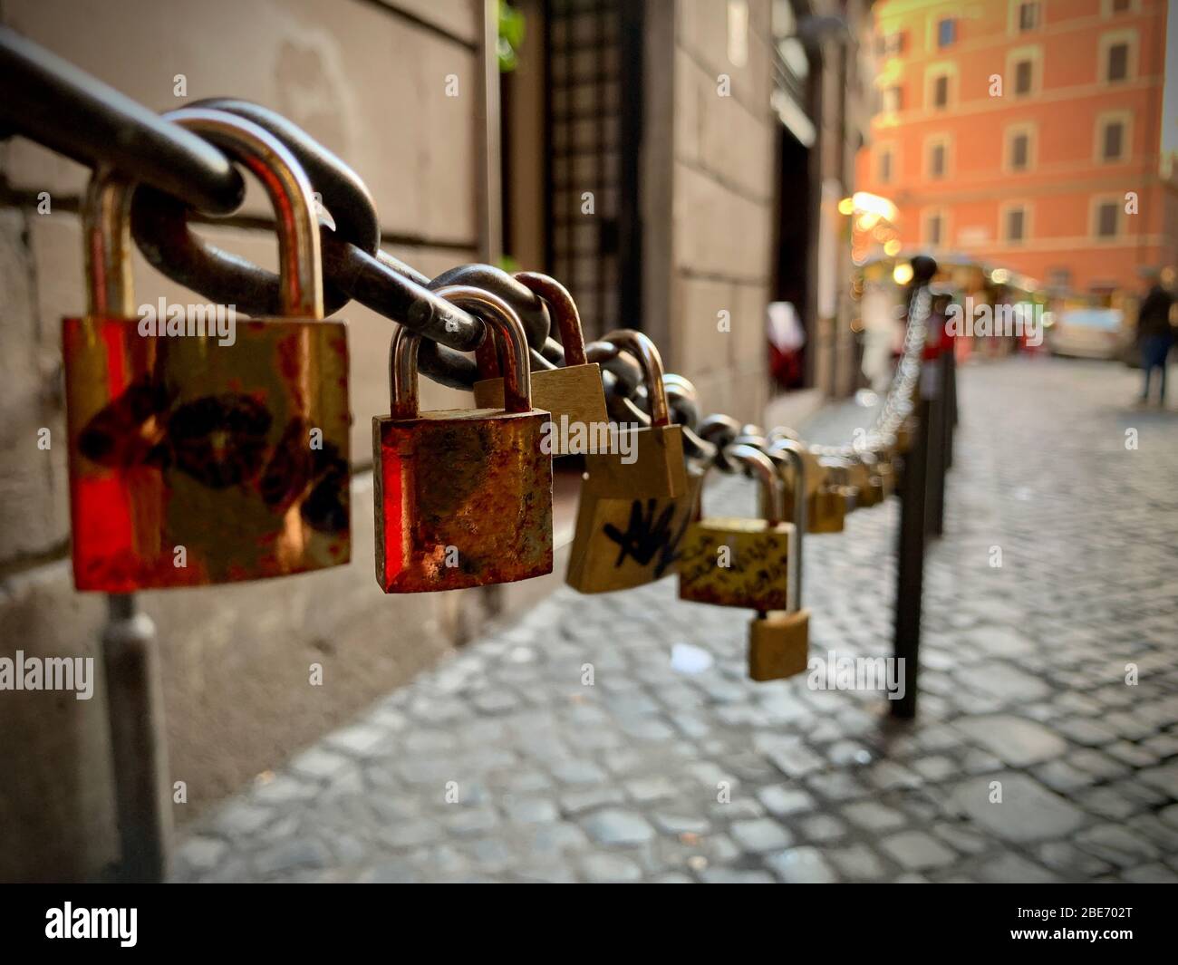 Love padlocks chained on a Rome street Stock Photo Alamy