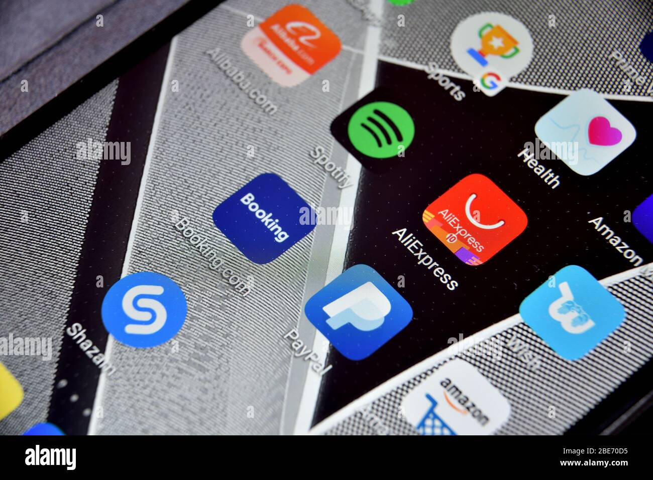 Valverde (CT), Italy - April 12, 2020: Close-up view of Aliexpress icon app on an Android smartphone, including other icons. Stock Photo