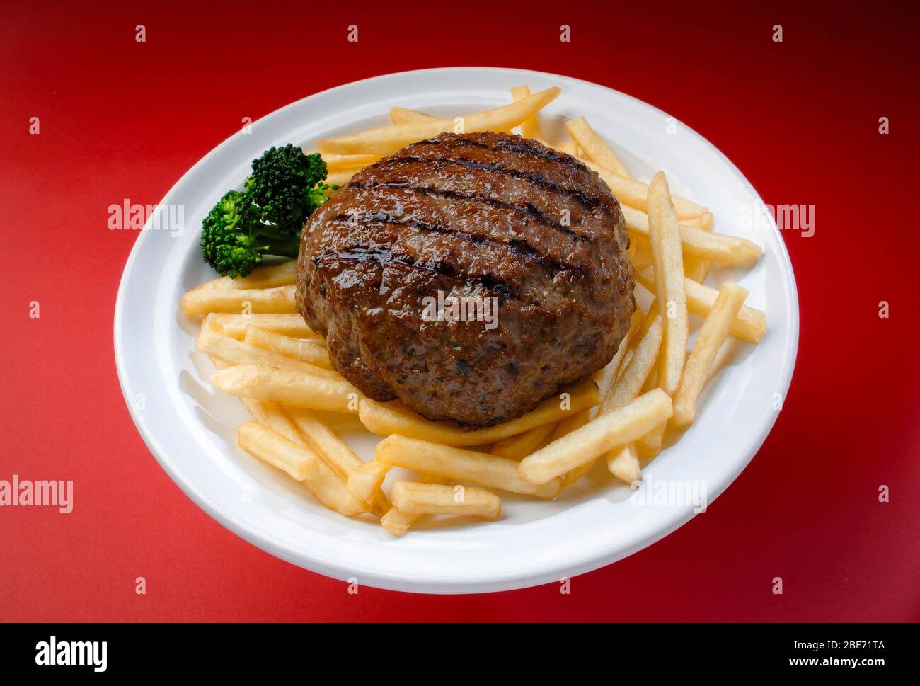 Delicious hamburger plate with french fries and broccoli Stock Photo