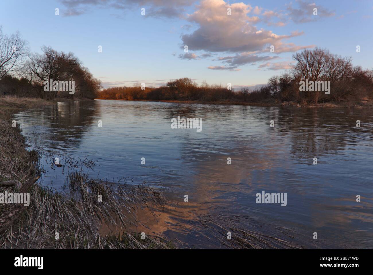 The Grand River at sunset in early spring. Shot in Waterloo, Ontario, Canada. Stock Photo