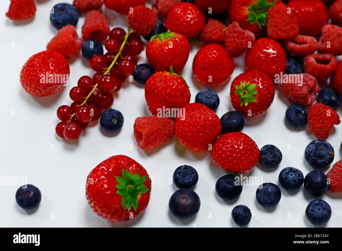 fresh mix berries on a white back ground Stock Photo