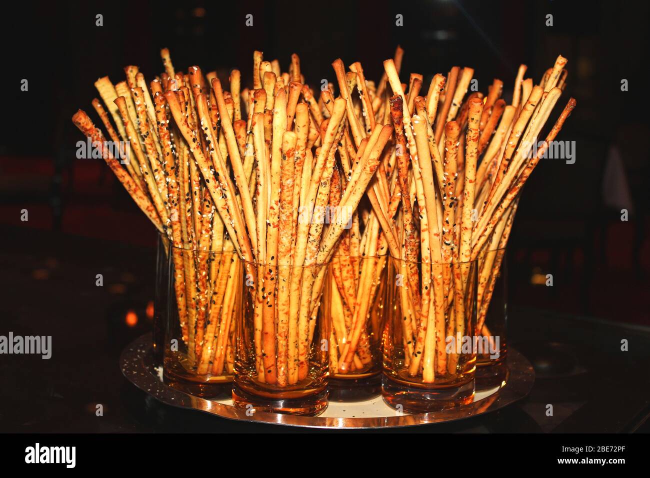 sesame coated crispy bread bread sticks Stock Photo Alamy
