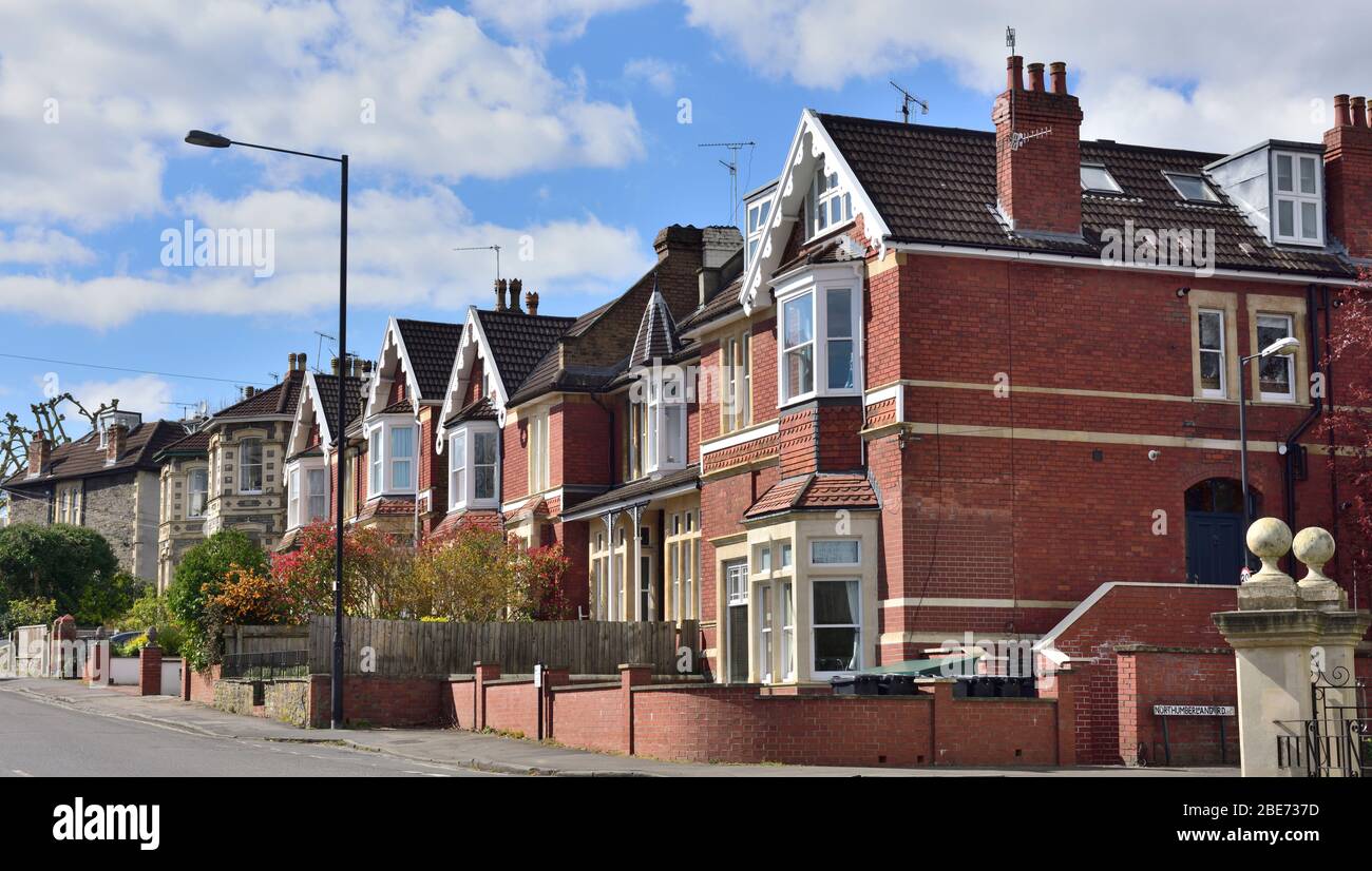 Row of older brick houses along street in Redland, Bristol, UK Stock