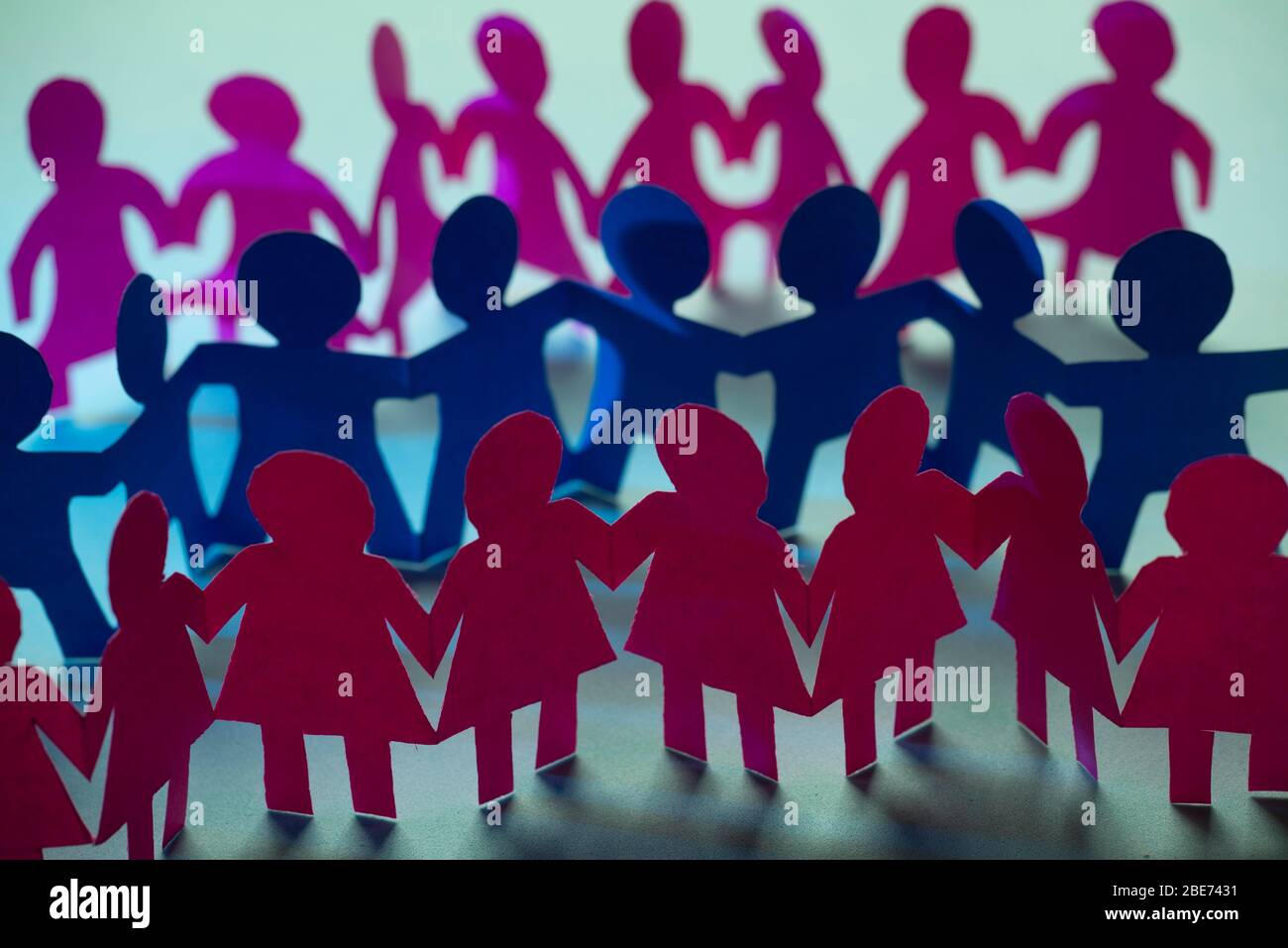 Paper dolls holding hands hires stock photography and images Alamy