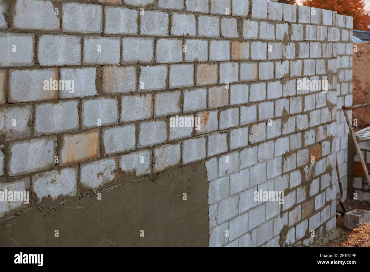 Founding a building of blocks with laying of foundation blocks