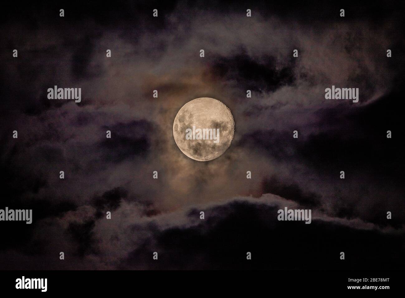 Full Moon on a Cloudy Night Stock Photo