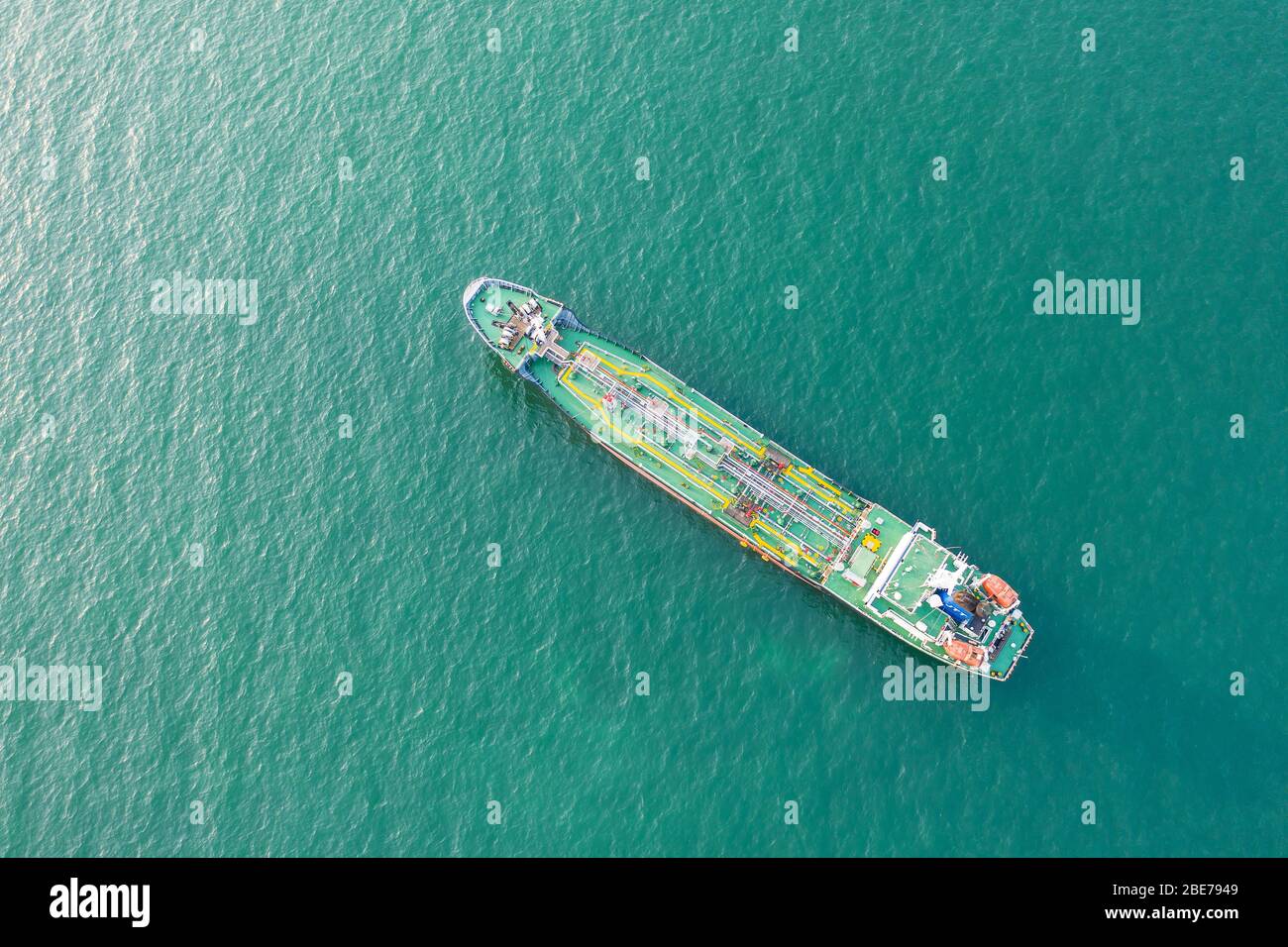 Aerial top view of the ship carrying the LPG and oil tanker in the sea port with vessel logistics. For energy export and import business for transport Stock Photo