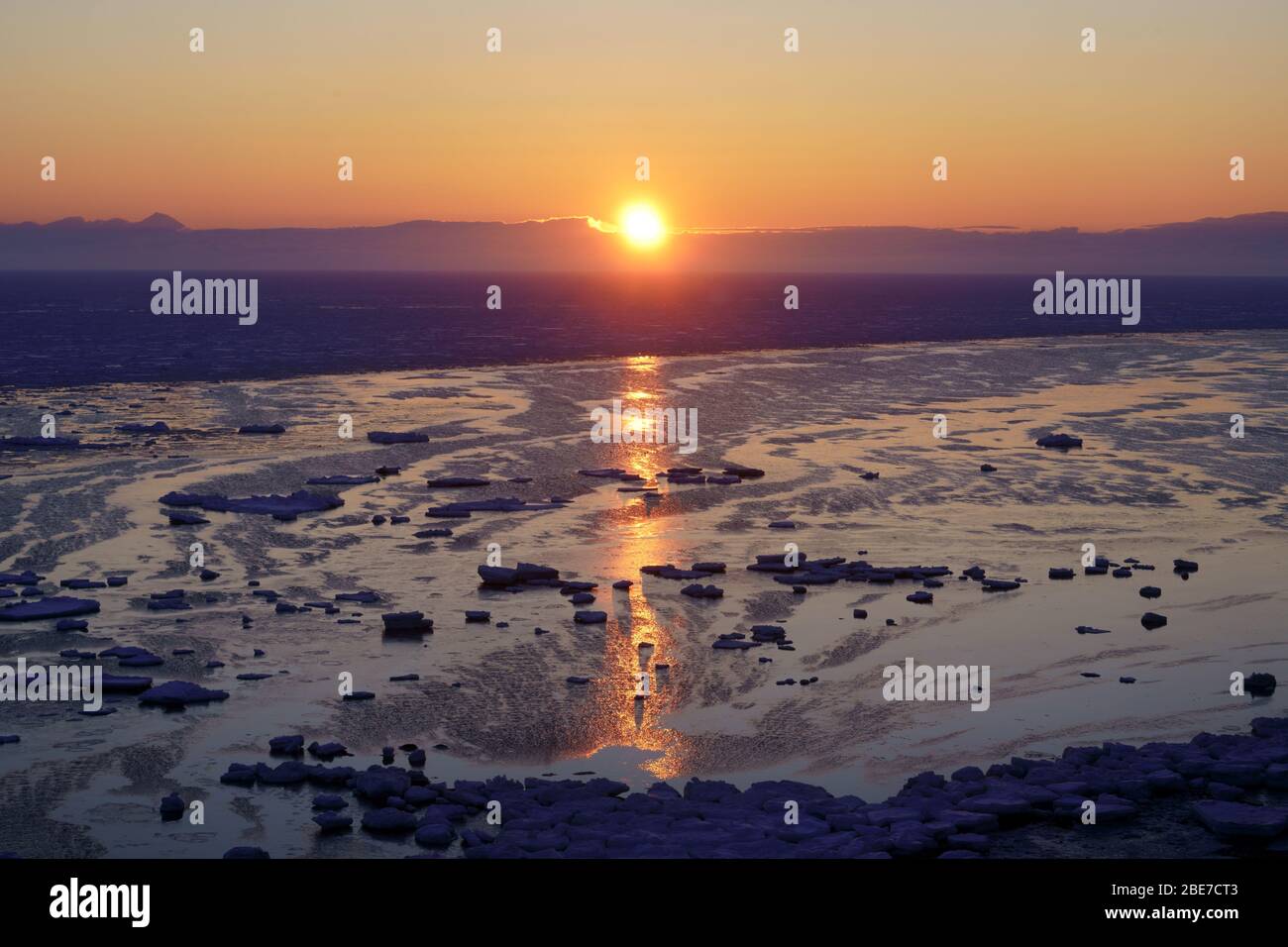 Sun Rising Ice Sunrise and Drift Ice Stock Photo - Alamy