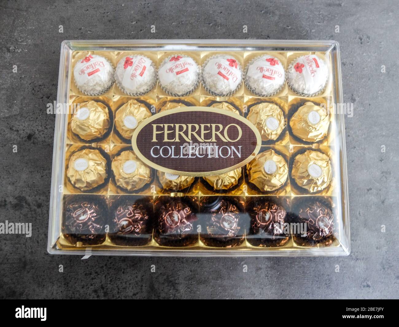 https://c8.alamy.com/comp/2BE7JFY/ferrero-chocolate-pralines-collection-box-with-raffaello-ferrero-rocher-and-rond-noirs-2BE7JFY.jpg