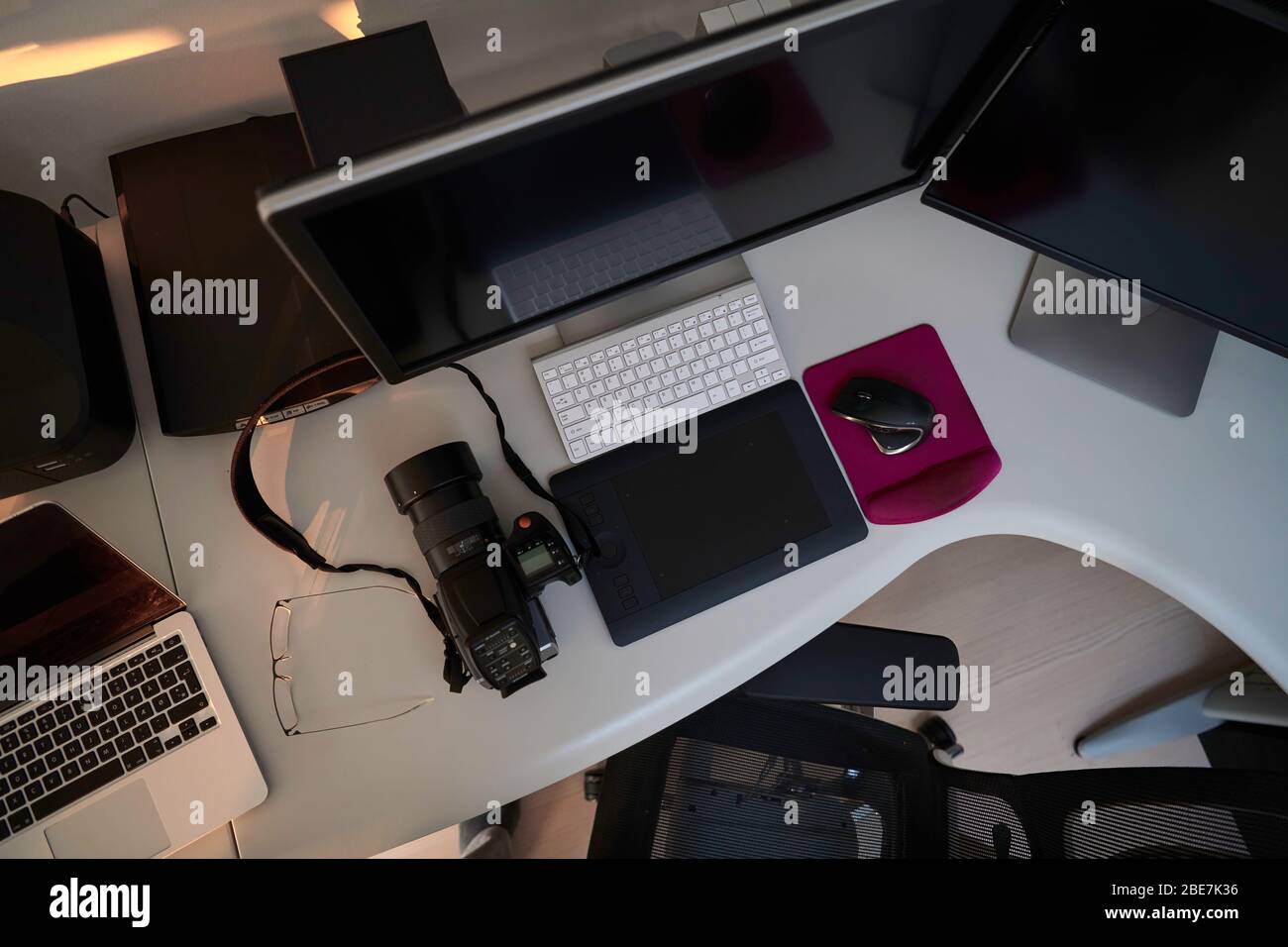 home office photographer workplace with workstation computer and dual