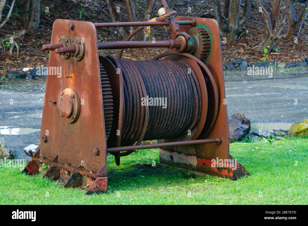 Old machinery used as lawn ornaments Stock Photo