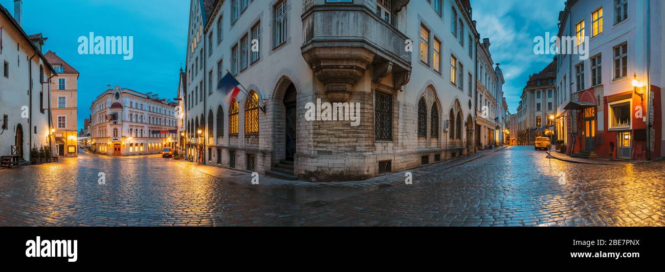 Tallinn, Estonia. Night Evening Panorama Panoramic View Of Old Vana turg And Suur-Karja Street In Tallinn. Stock Photo