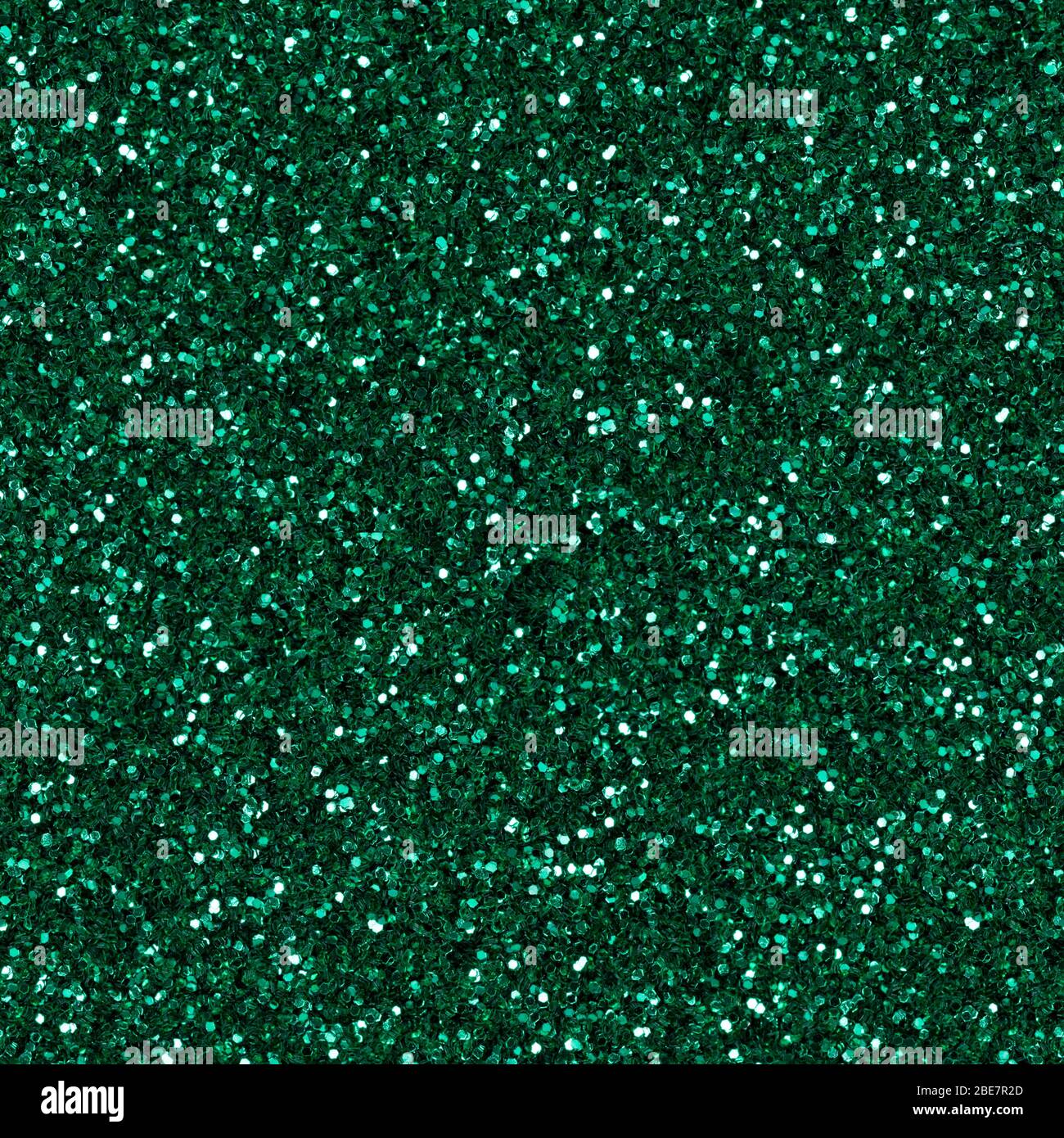 Elegant, contrast green glitter, sparkle confetti texture. Christmas abstract background, seamless pattern. Stock Photo